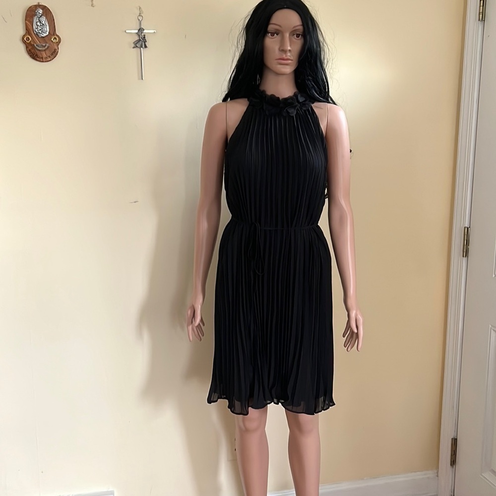 Beautiful little black pleated dress with neck detail and tie waist